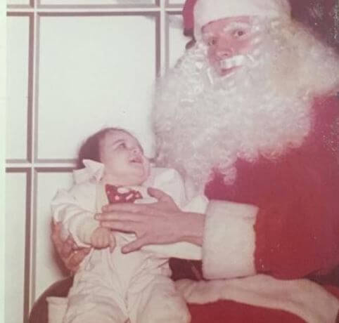 Jake Taylor mother Jennifer Taylor as a child with Santa.